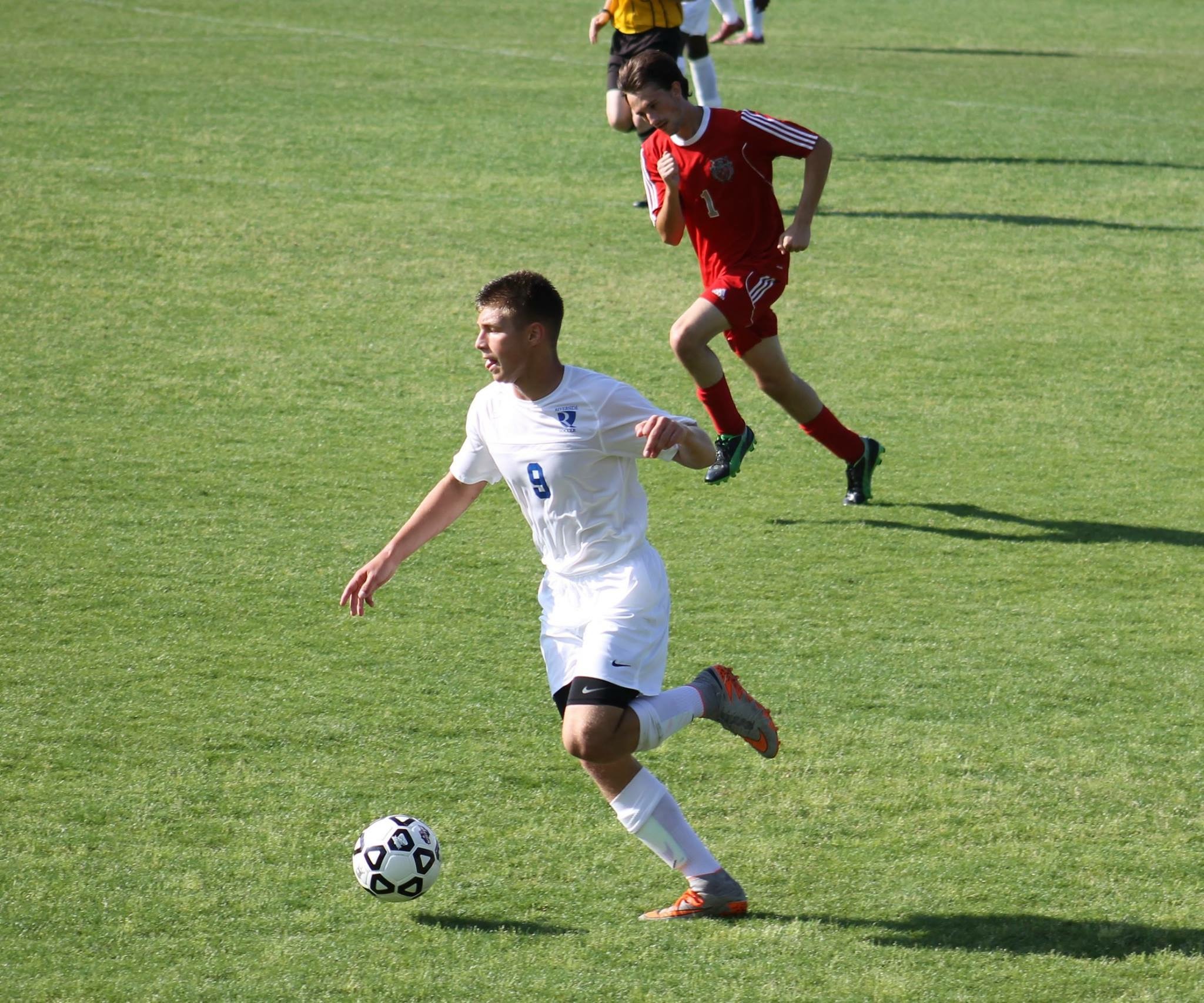 Carlos playing football