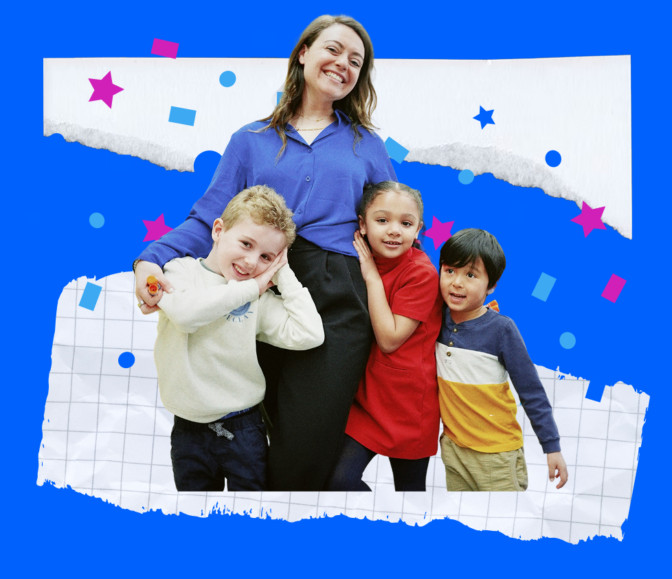A teacher celebrating with her students with decorative elements behind her.