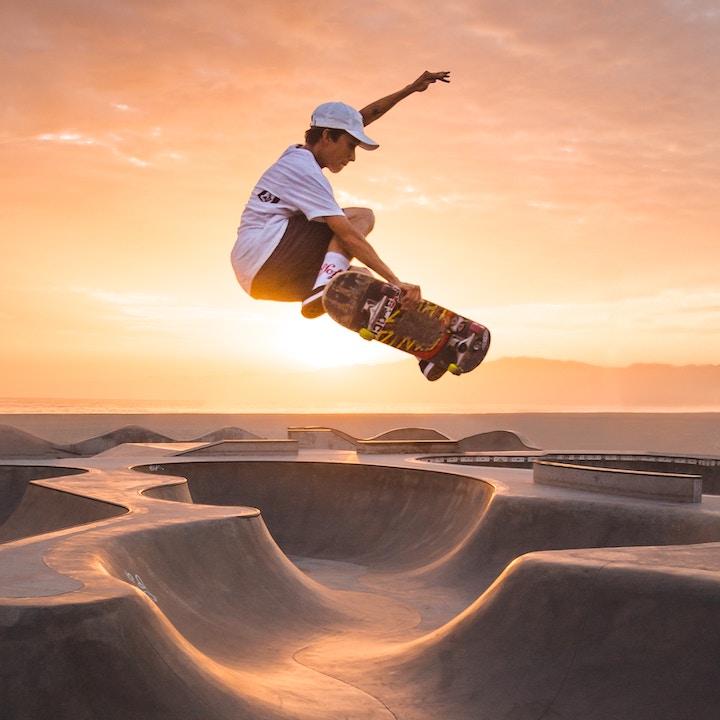 skateboarder doing a trick mid air