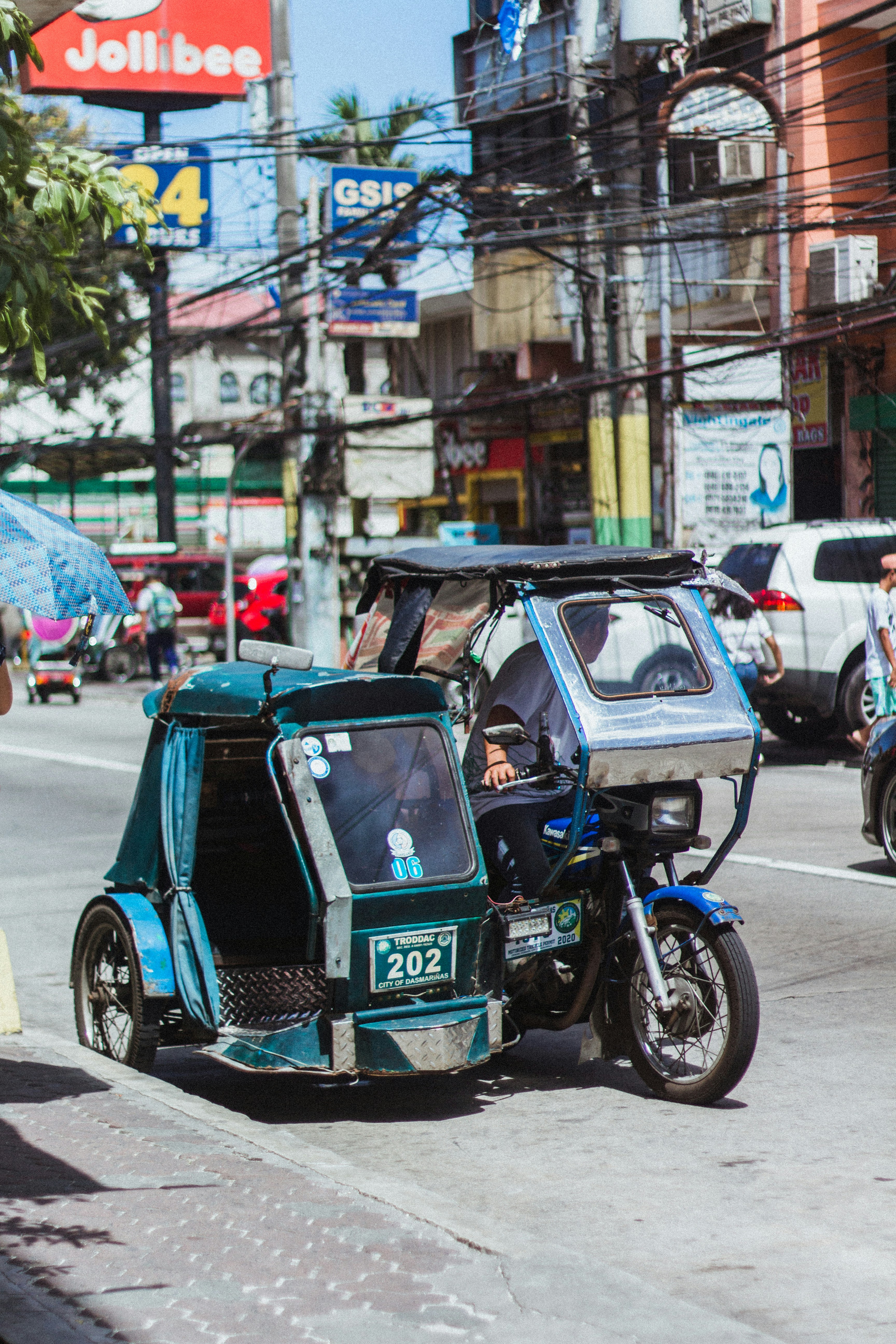 cars on a busy street in the philippines